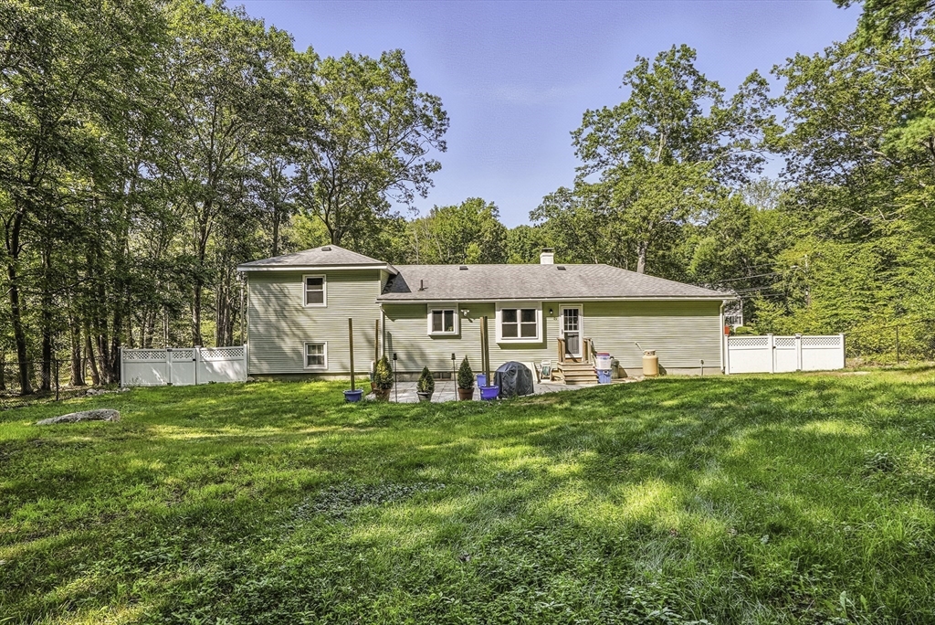 334 Mendon Road Northbridge, MA 01534 - Photo 28 of 31 a view of a house with a yard and sitting area