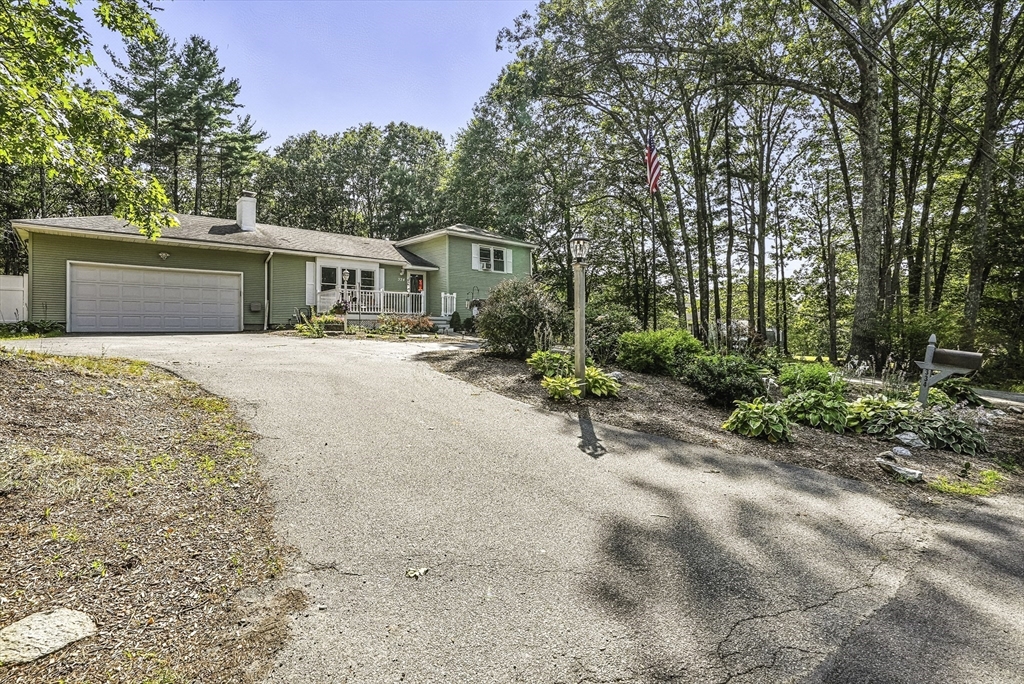 334 Mendon Road Northbridge, MA 01534 - Photo 31 of 31 a front view of a house with a garden