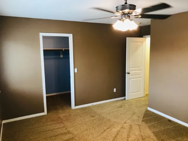 a bathroom with a shower and a sink