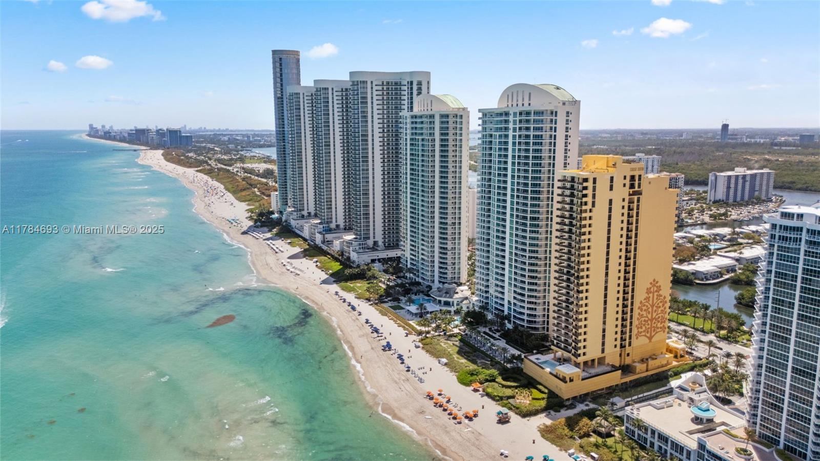 16275 Collins Avenue, Unit 2202 Sunny Isles Beach, FL 33160 - Photo 22 of 23 a view of a city with tall buildings