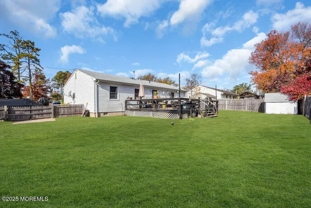 a view of a house with a big yard