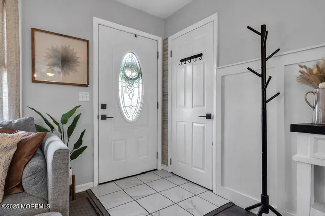 a view of livingroom with furniture and window