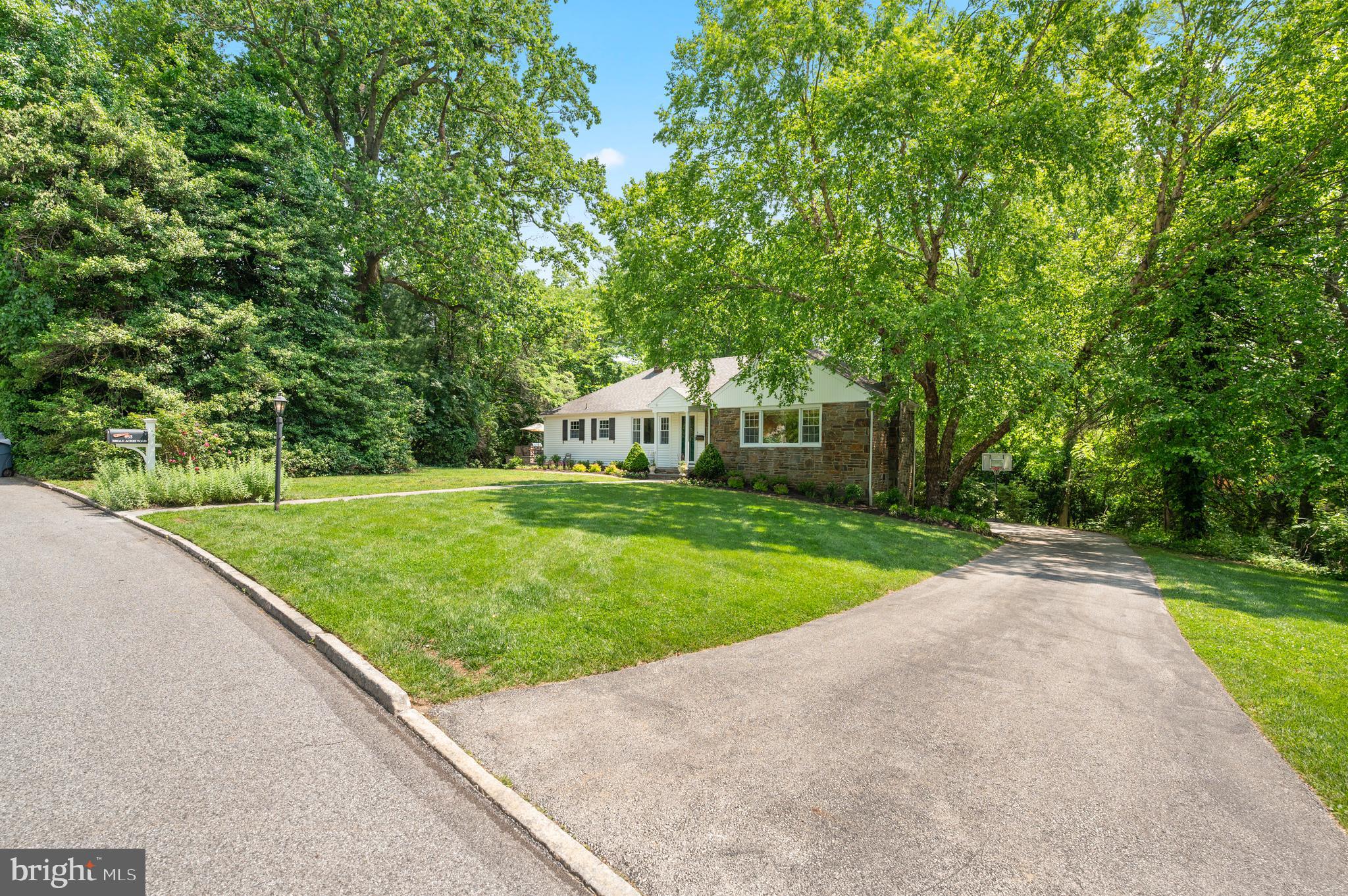 653 Broad Acres Road Penn Valley, PA 19072 - Photo 3 of 35 a view of a house with a yard