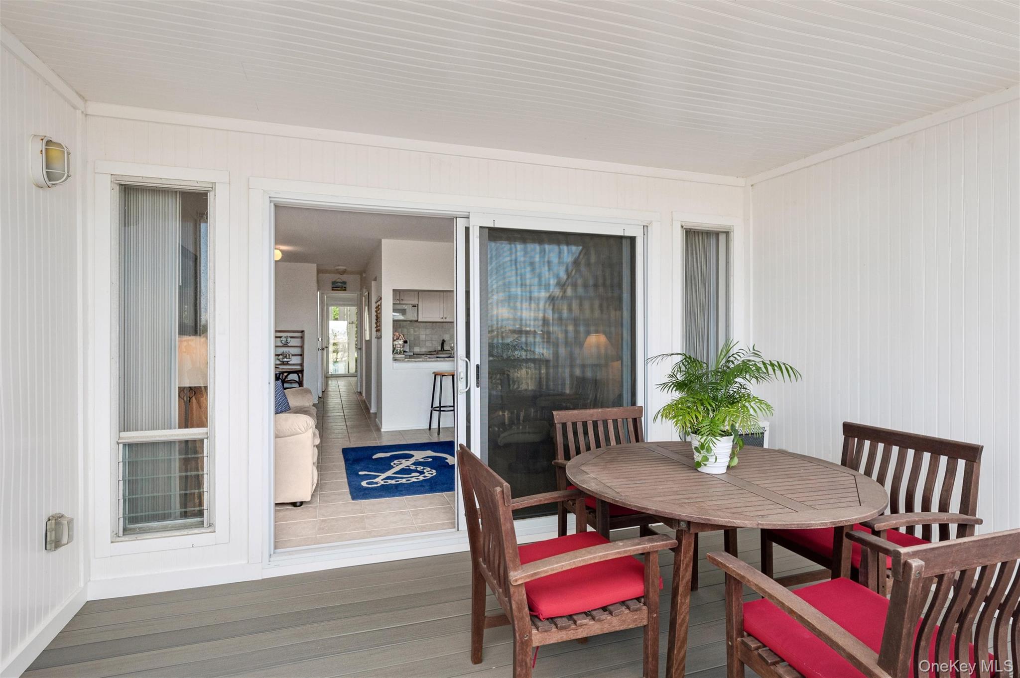 274 Dune Road Westhampton Beach, NY 11978 - Photo 12 of 18 Sliding doors to deck
