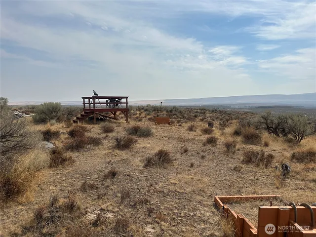 an aerial view of house with yard