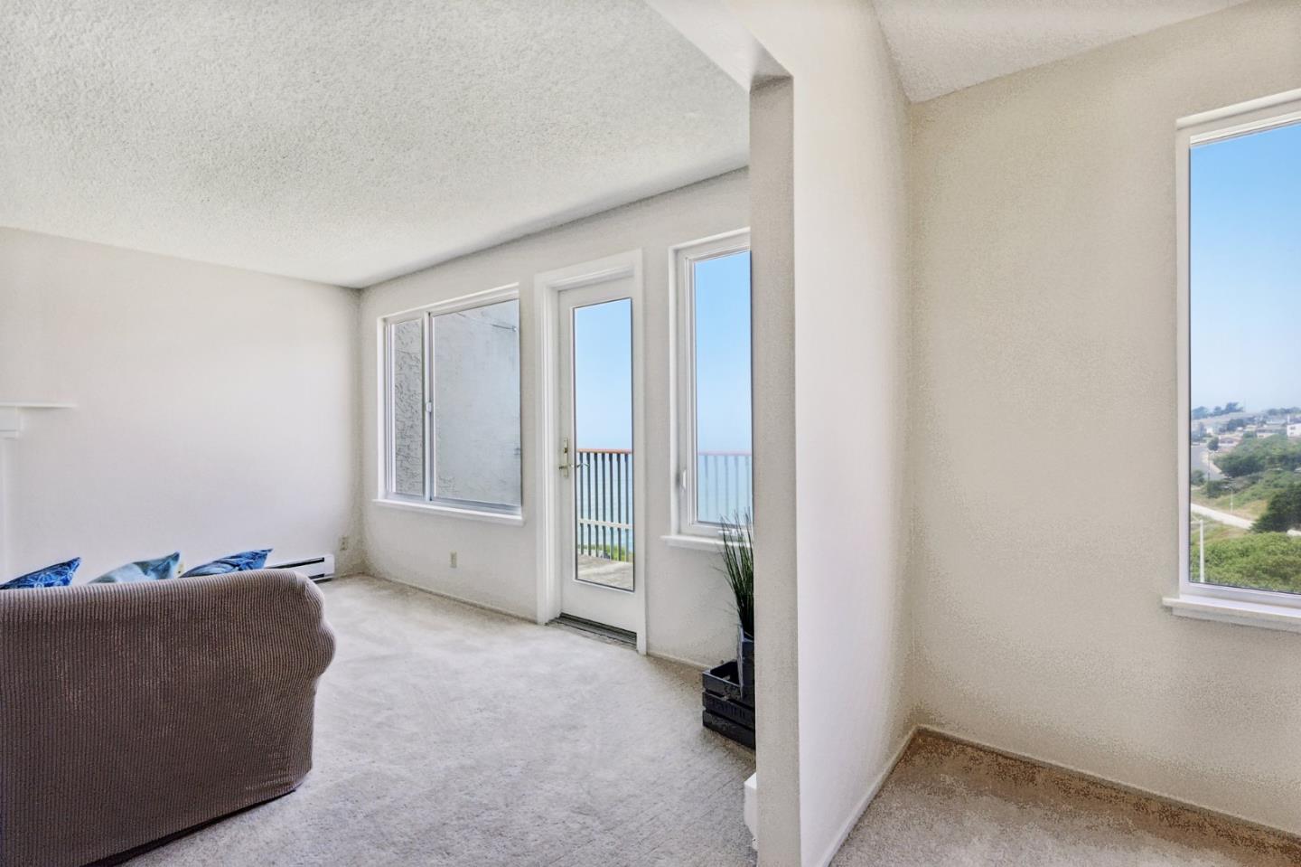 5003 Palmetto Avenue, Unit 89 Pacifica, CA 94044 - Photo 13 of 46 a view of livingroom with furniture and window