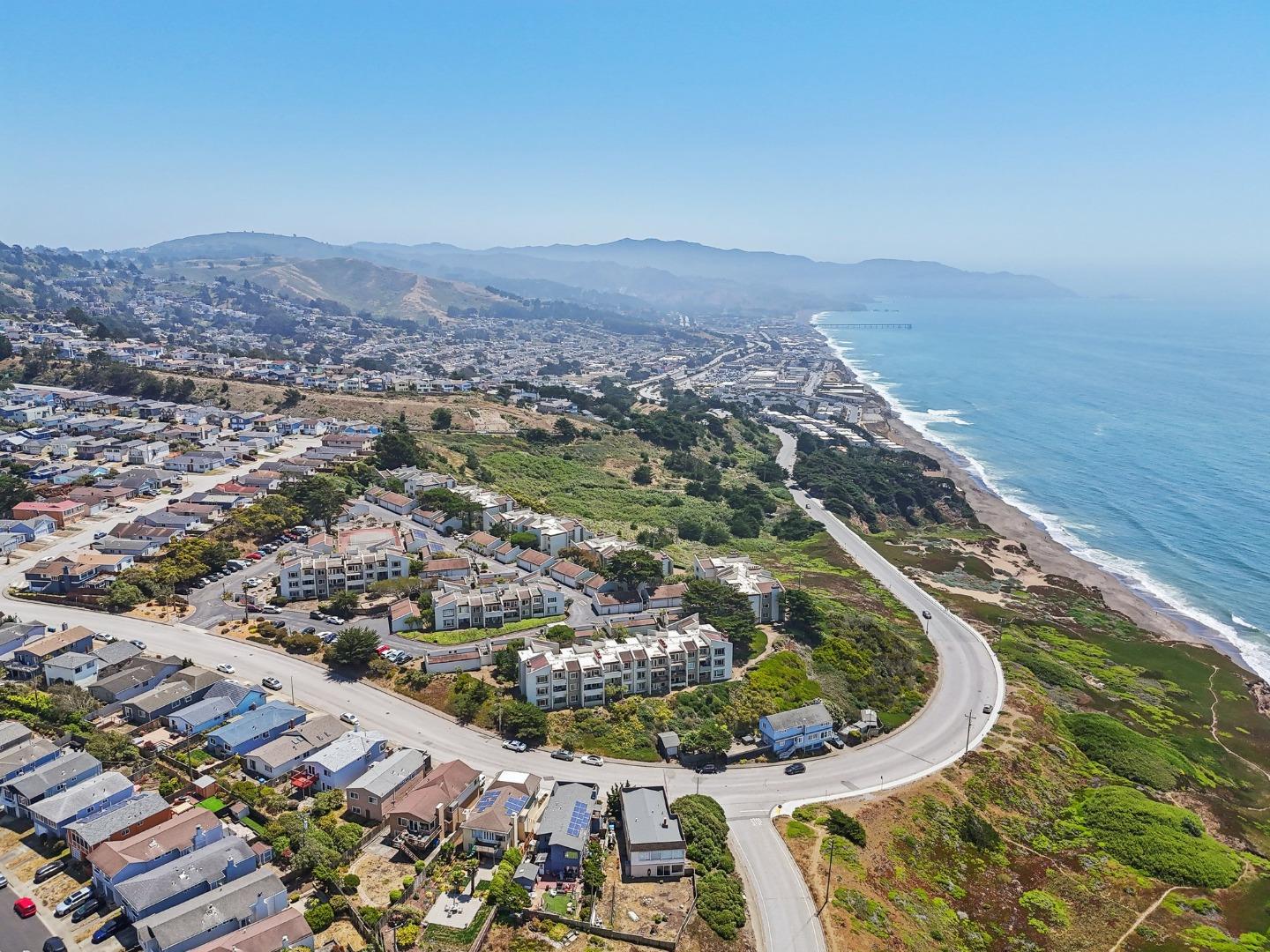 5003 Palmetto Avenue, Unit 89 Pacifica, CA 94044 - Photo 36 of 46 an aerial view of residential houses with outdoor space