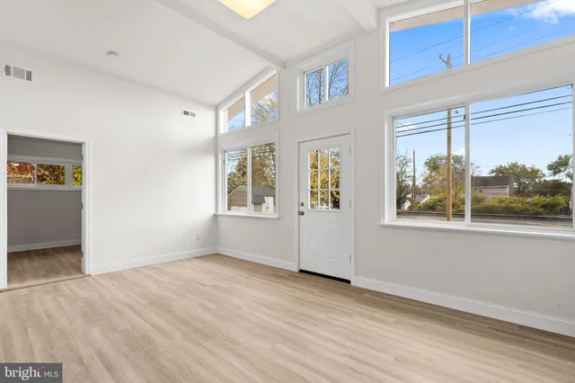 an empty room with windows