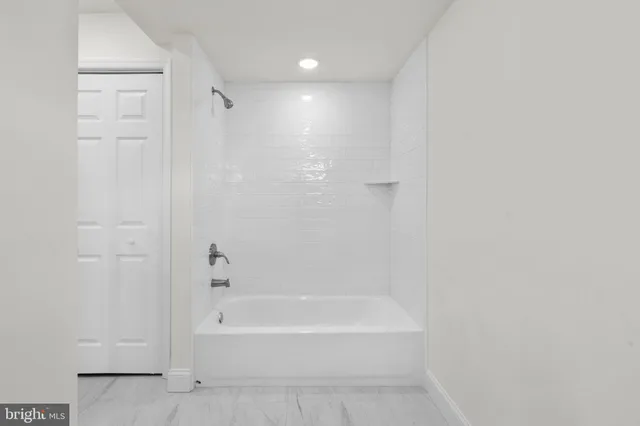 a bathroom with a bathtub