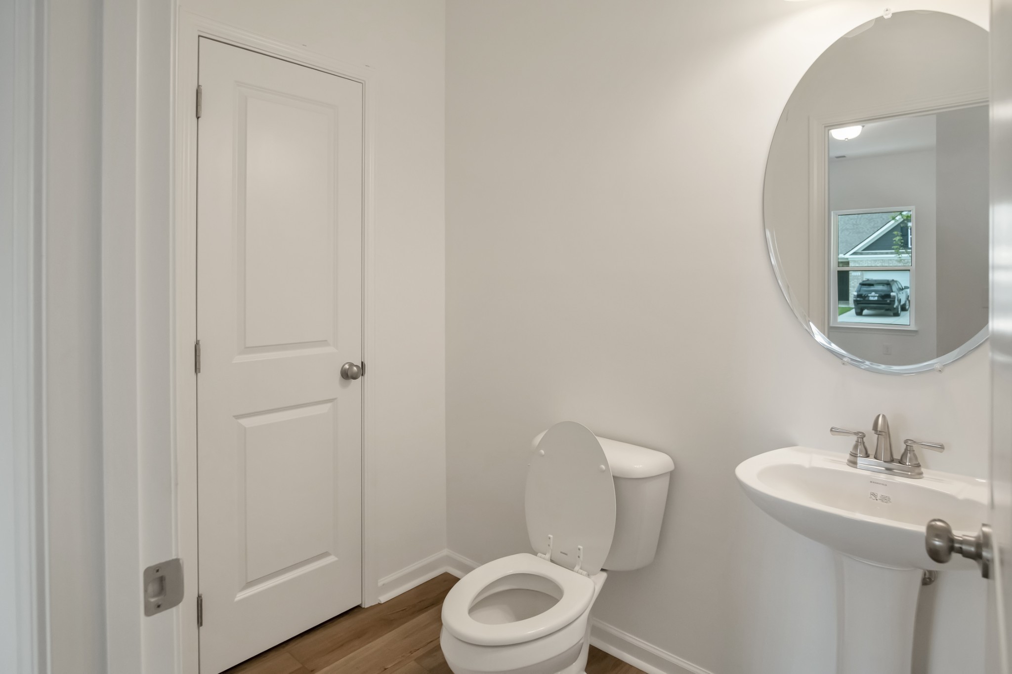 769 Chiswick Court Lebanon, TN 37087 - Photo 13 of 44 a bathroom with a toilet a sink and mirror