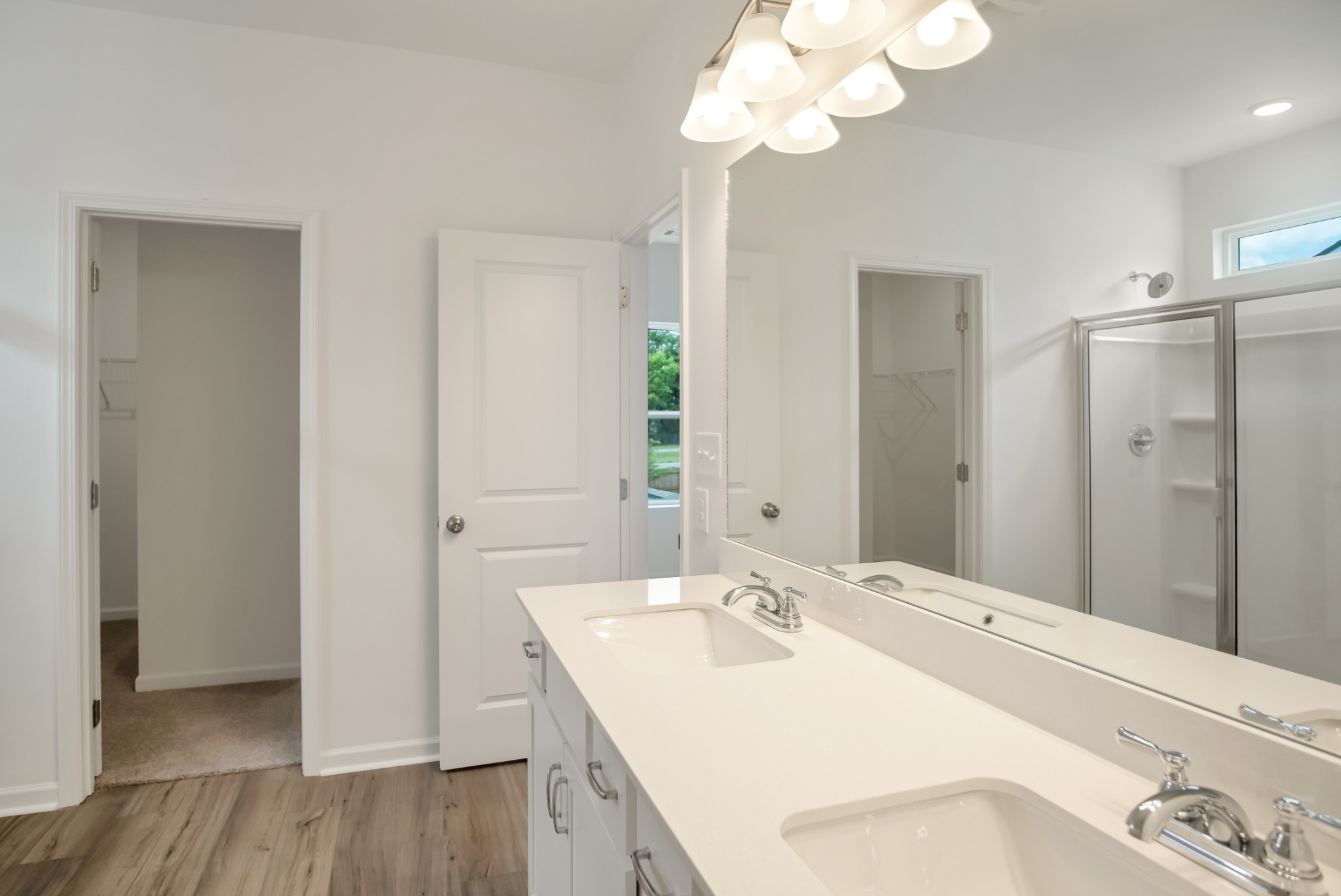 769 Chiswick Court Lebanon, TN 37087 - Photo 26 of 44 a bathroom with a sink a mirror and a shower