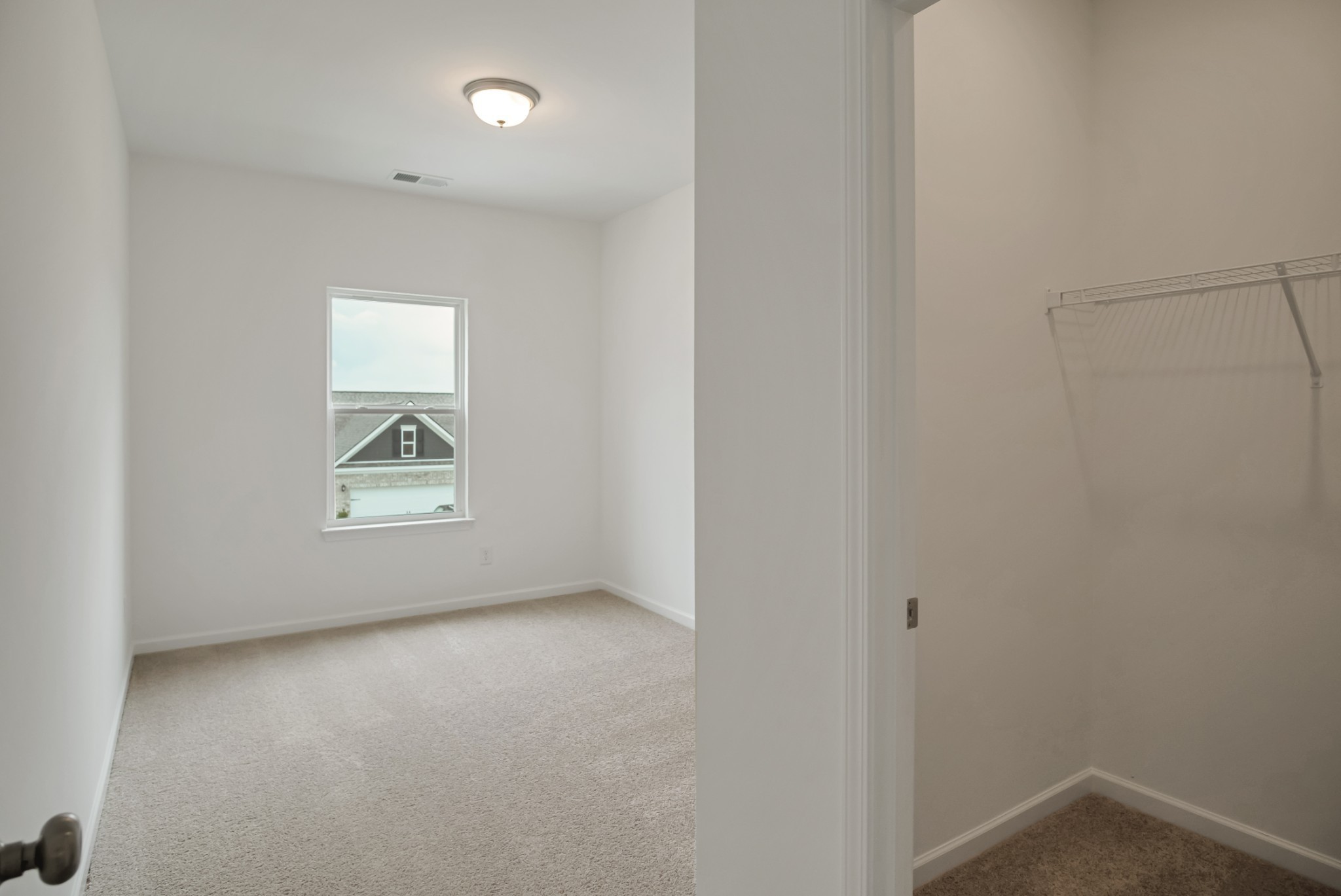 769 Chiswick Court Lebanon, TN 37087 - Photo 34 of 44 a view of an empty room and a window