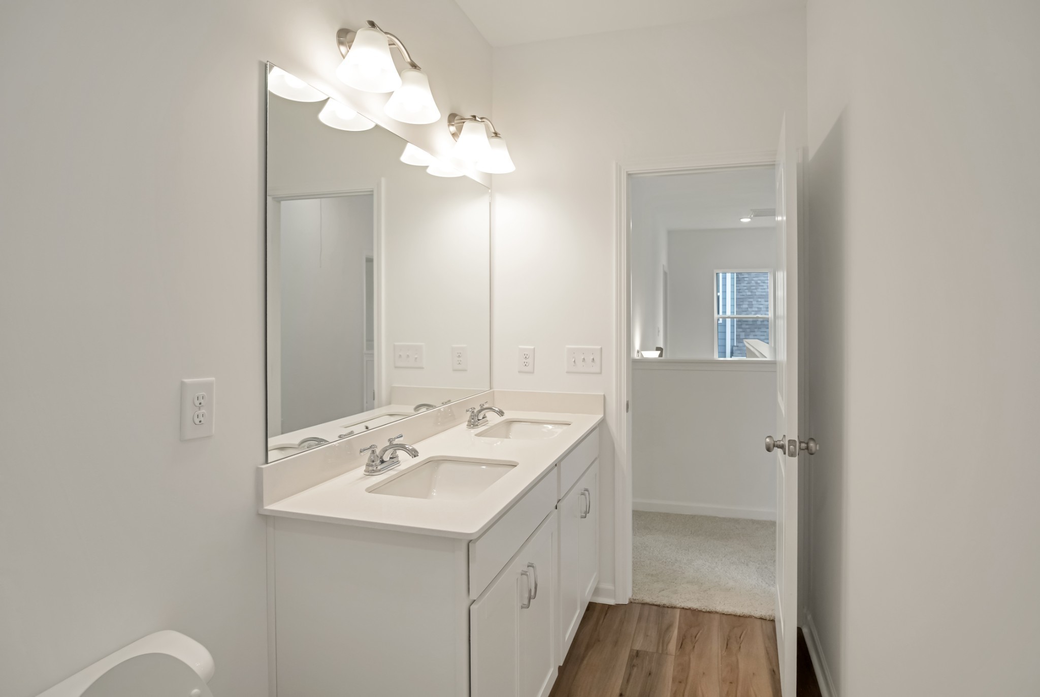 769 Chiswick Court Lebanon, TN 37087 - Photo 5 of 44 a bathroom with a sink a light fixture and a mirror