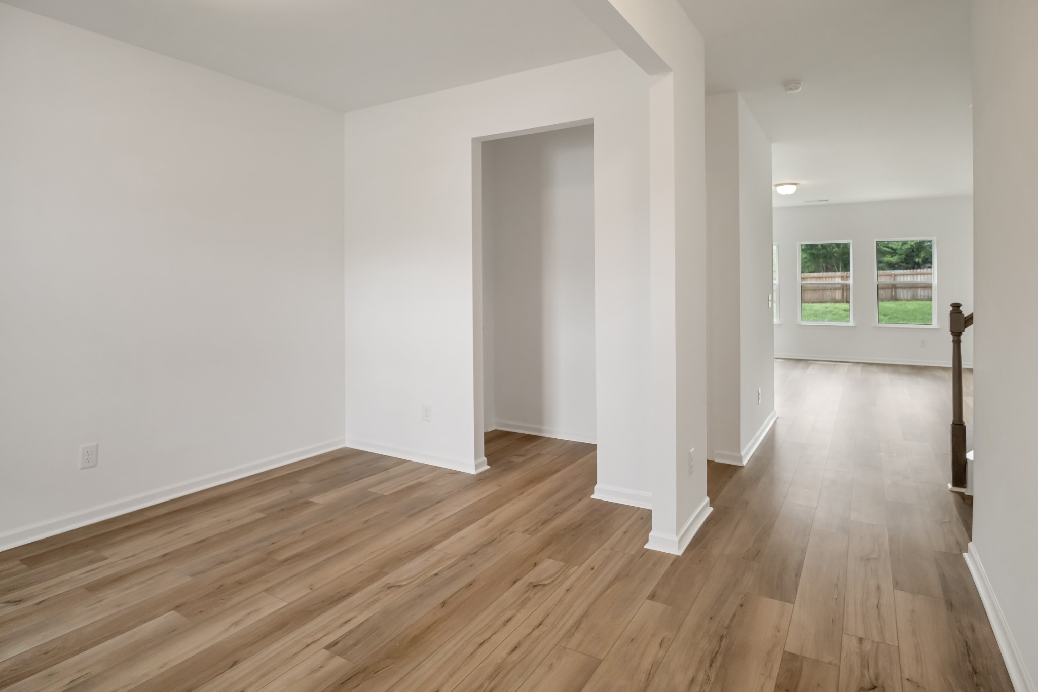 769 Chiswick Court Lebanon, TN 37087 - Photo 10 of 44 wooden floor in a hall with an empty room