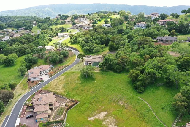a view of a lake with a yard