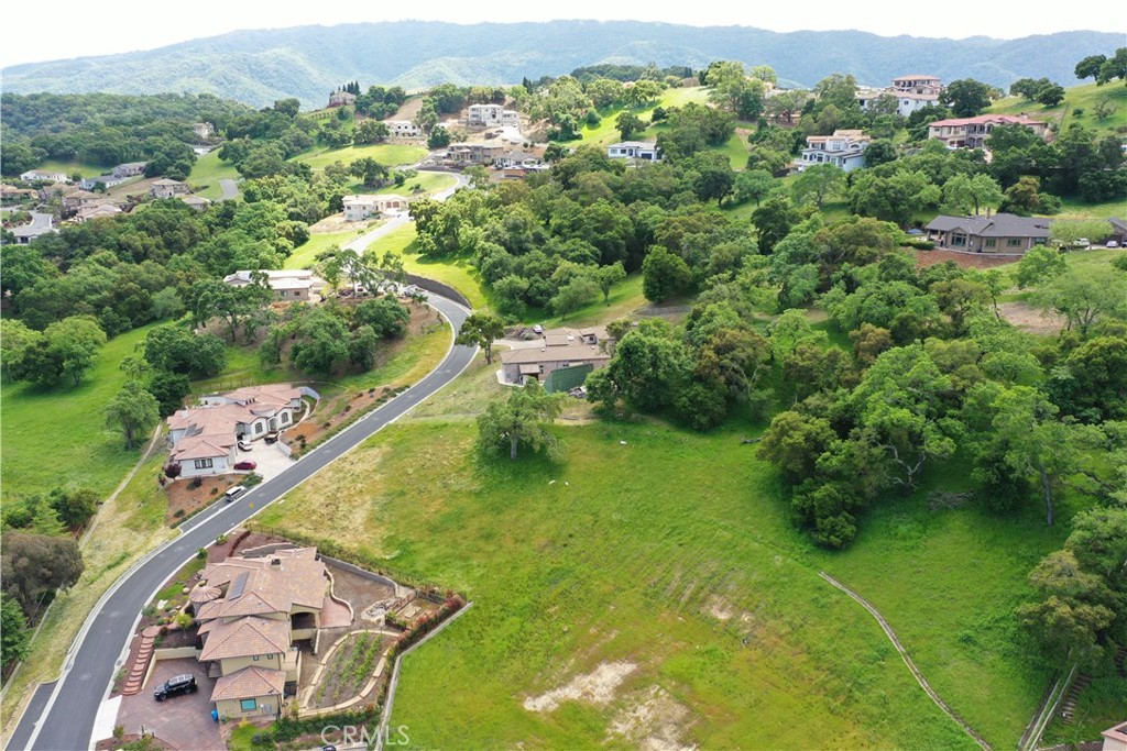 1810 Carob Court Gilroy, CA 95020 - Photo 7 of 22 a view of a lake with a yard