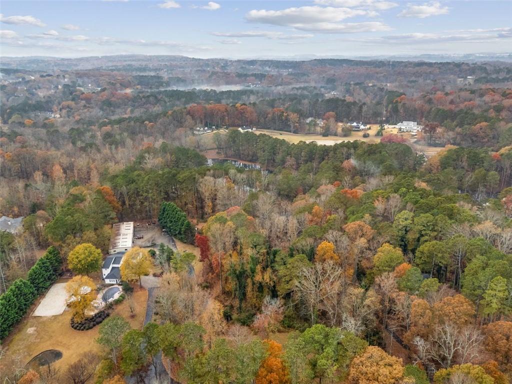 3116 Batesville Road Woodstock, GA 30188 - Photo 2 of 7 an aerial view of residential houses with outdoor space