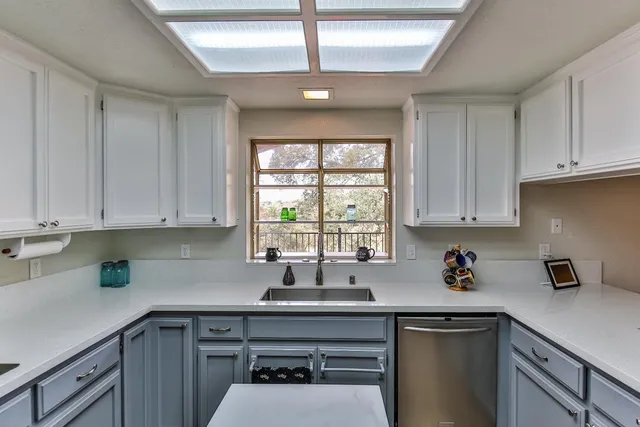 a view of balcony with wooden floor and outdoor seating