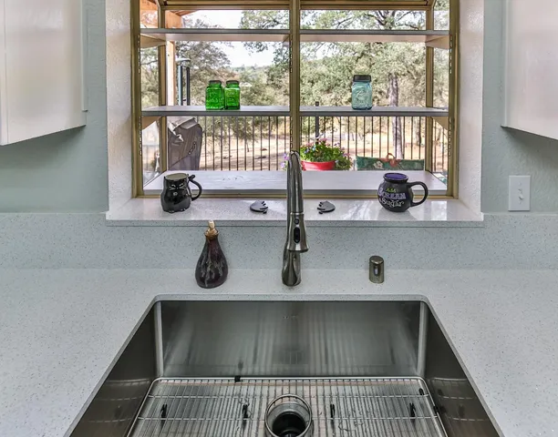 a view of a lake with trees by side of it