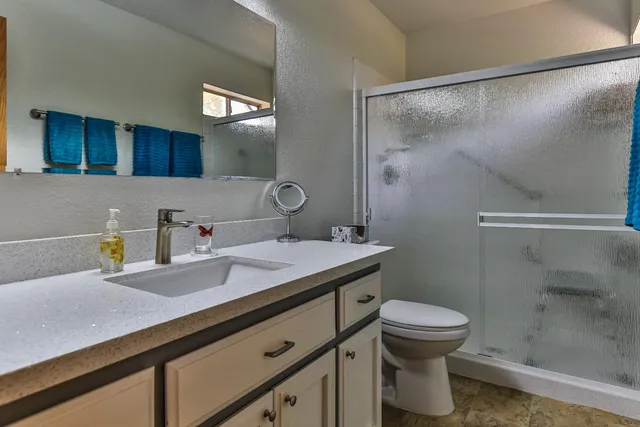 a view of a yard from a balcony