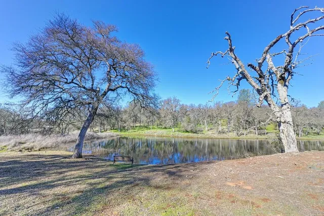 a bathroom with a sink and a large mirror