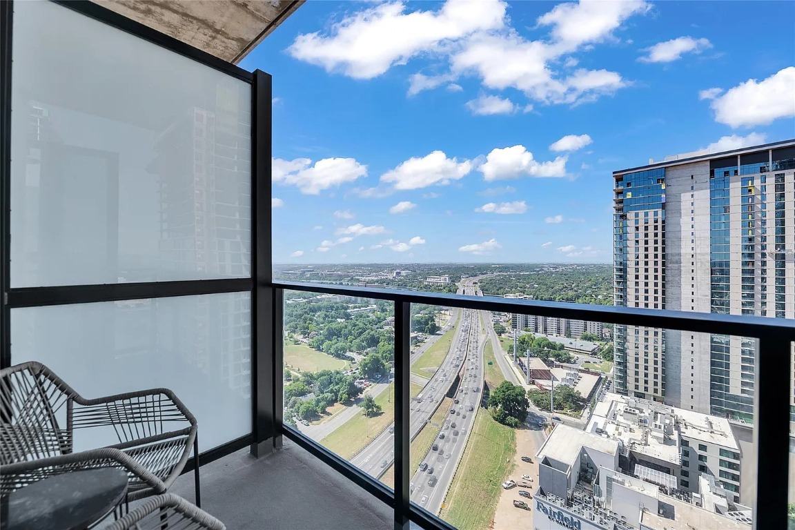 84 East Avenue, Unit 3208 Austin, TX 78701 - Photo 15 of 28 a view of a balcony with chair
