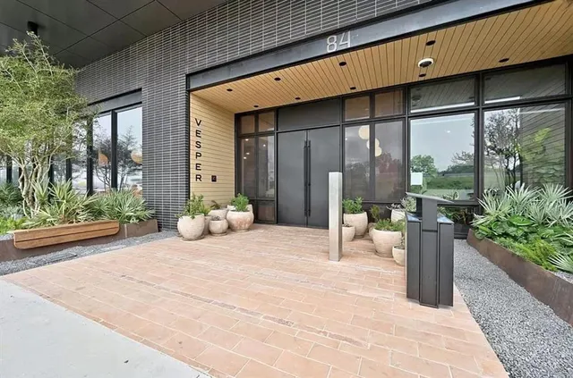 a front view of a house with a outdoor seating