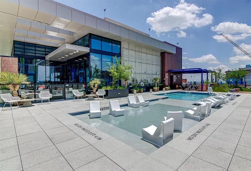 84 East Avenue, Unit 3208 Austin, TX 78701 - Photo 20 of 28 a view of a kitchen with furniture and a potted plant