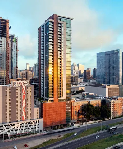 a view of a city with tall buildings