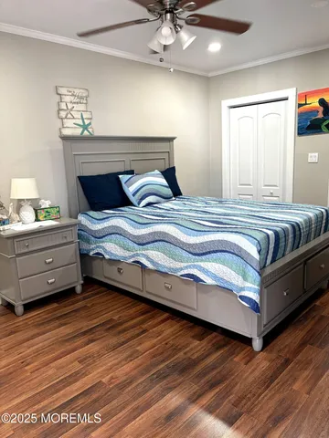 a bedroom with bed and window