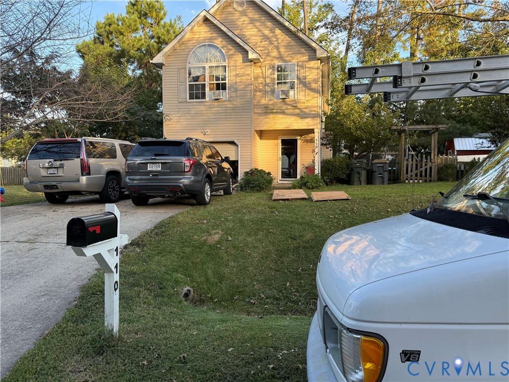 110 Chardonnay Road Williamsburg, VA 23185 - Photo 2 of 11 a couple of cars parked in front of a house