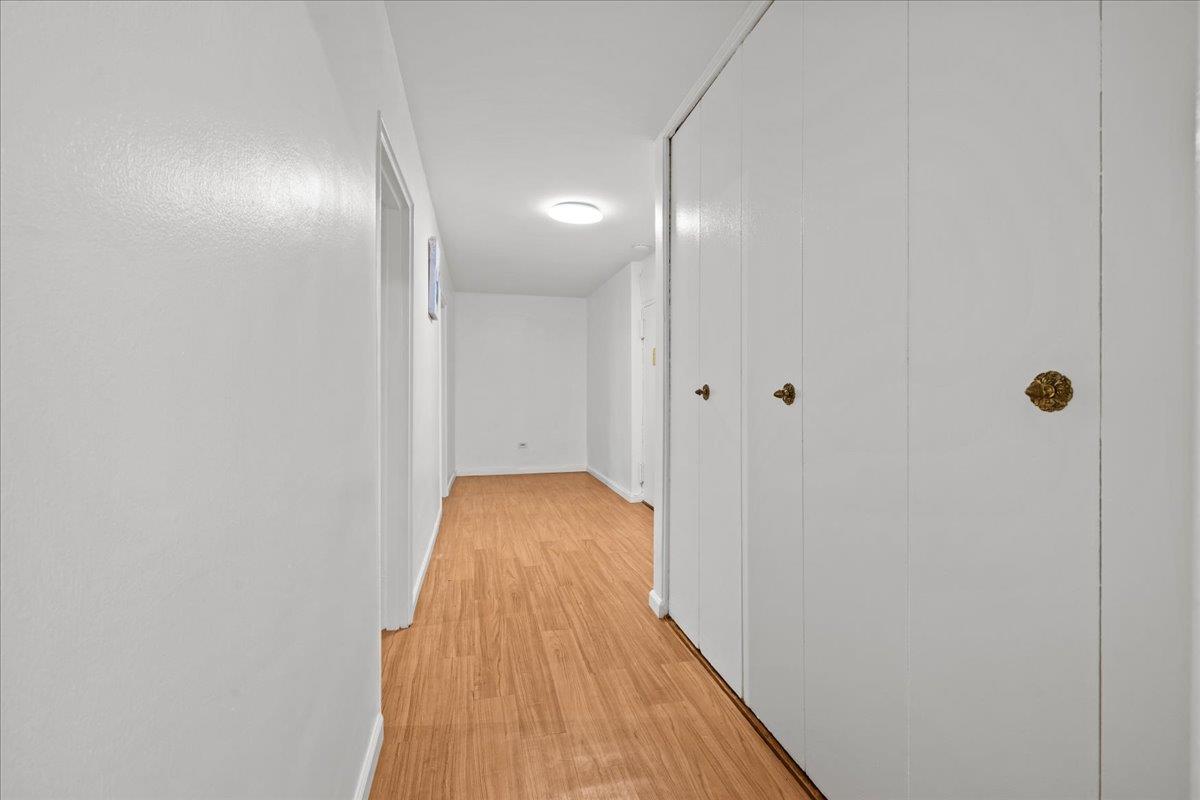 629 Kappock Street, Unit 1N Bronx, NY 10463 - Photo 2 of 12 a view of a hallway with wooden floor