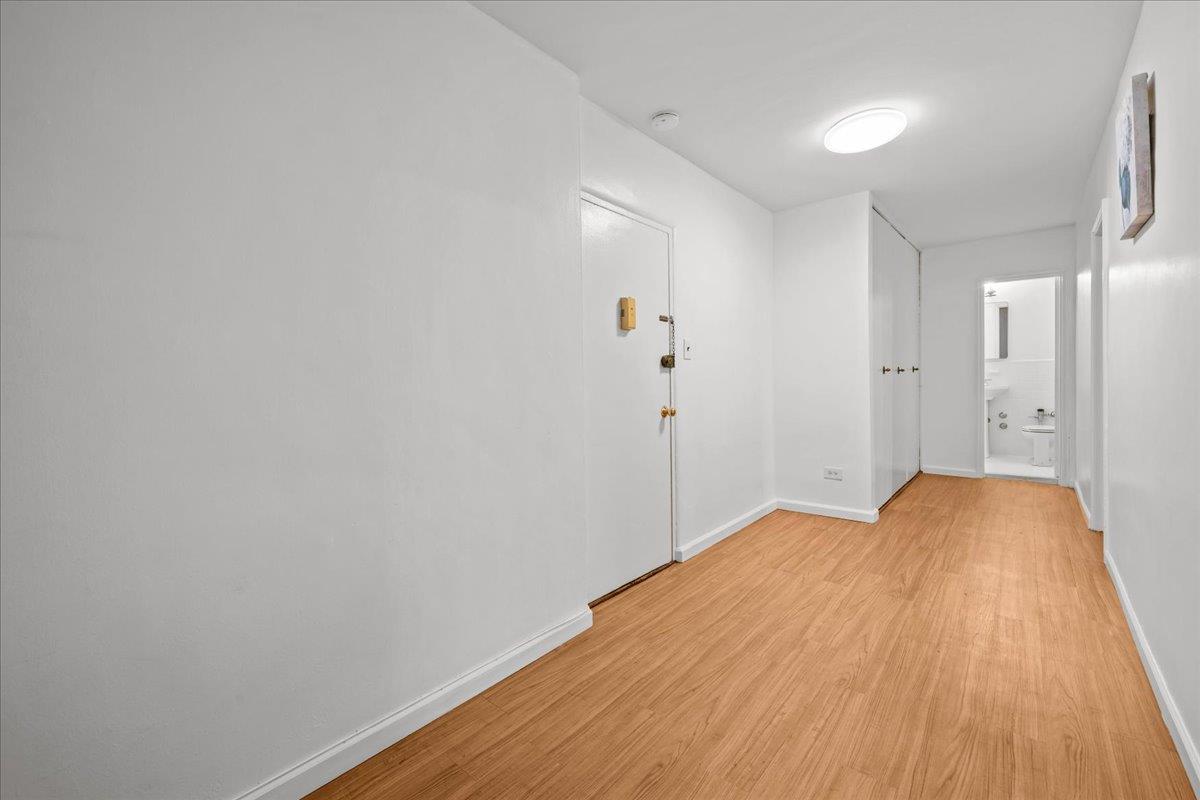 629 Kappock Street, Unit 1N Bronx, NY 10463 - Photo 3 of 12 a view of empty room with wooden floor
