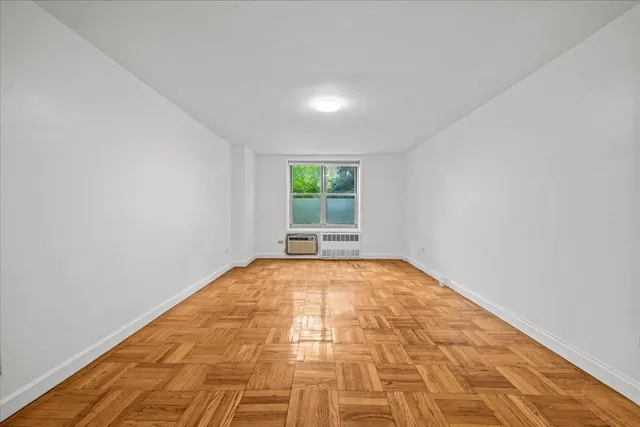 an empty room with window