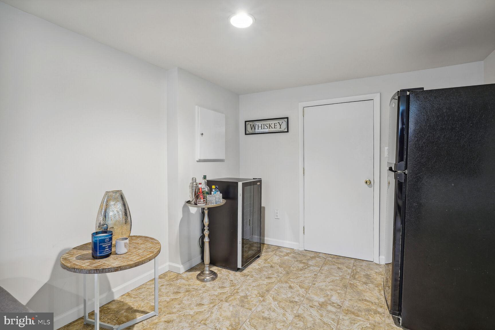 10609 Hayes Avenue Silver Spring, MD 20902 - Photo 23 of 27 Basement bar area