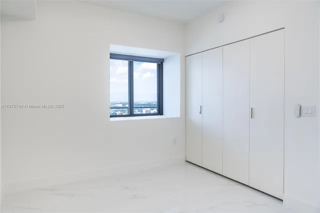 a patio with table and chairs