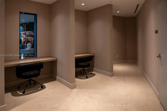 a kitchen with a sink and a stove top oven