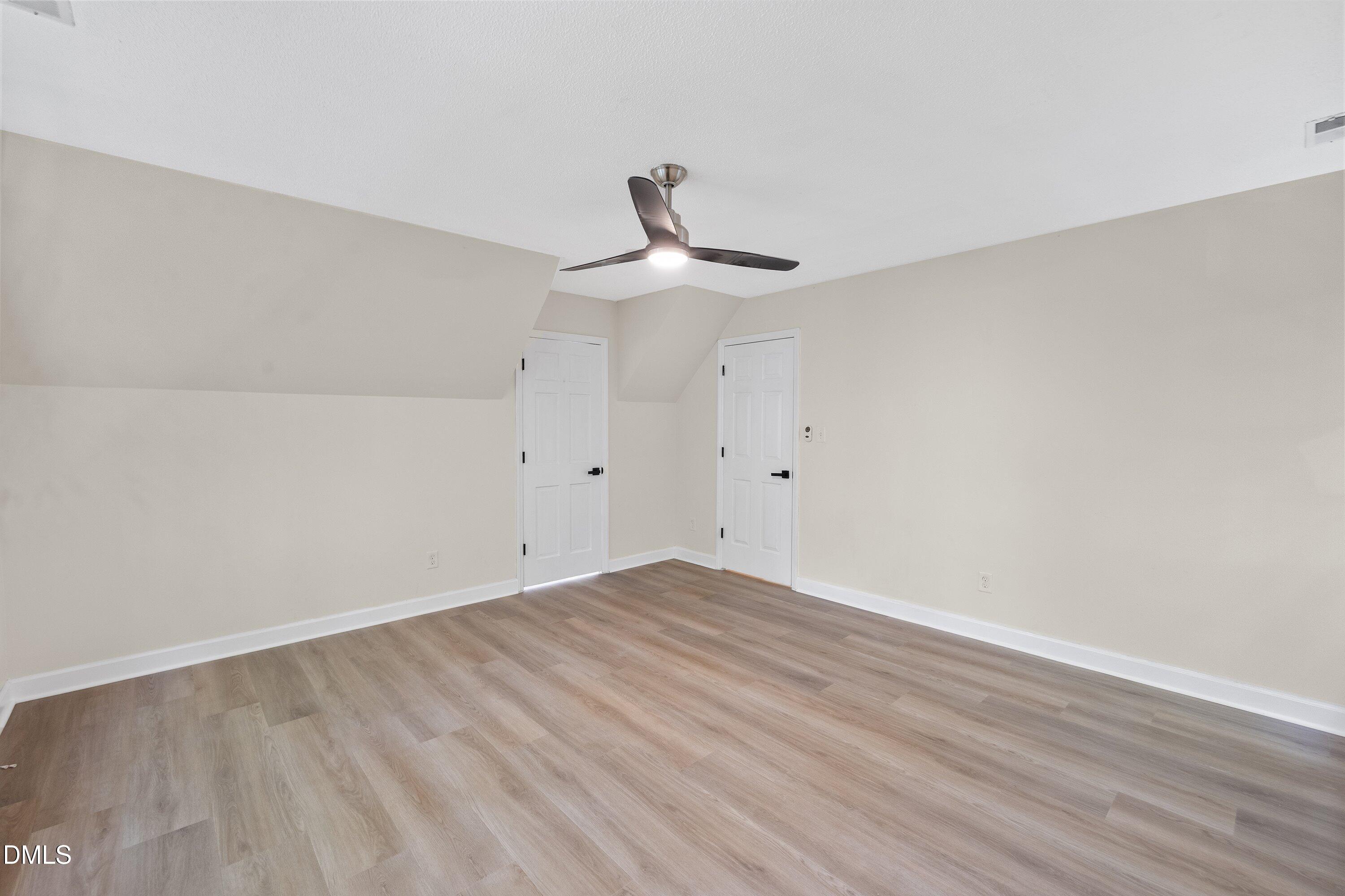 2517 Birchford Court Raleigh, NC 27604 - Photo 53 of 63 a view of empty room with wooden floor