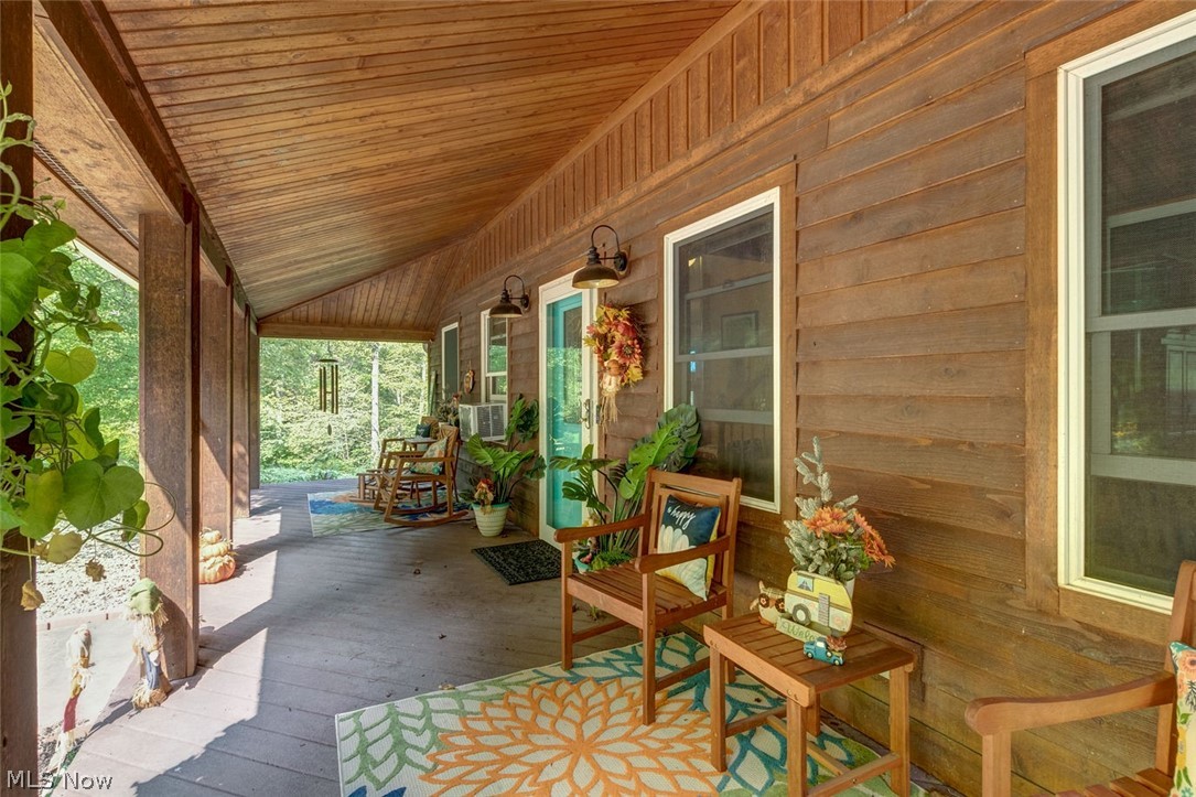 16105 Madison Road Middlefield, OH 44062 - Photo 2 of 35 Lovely covered front porch