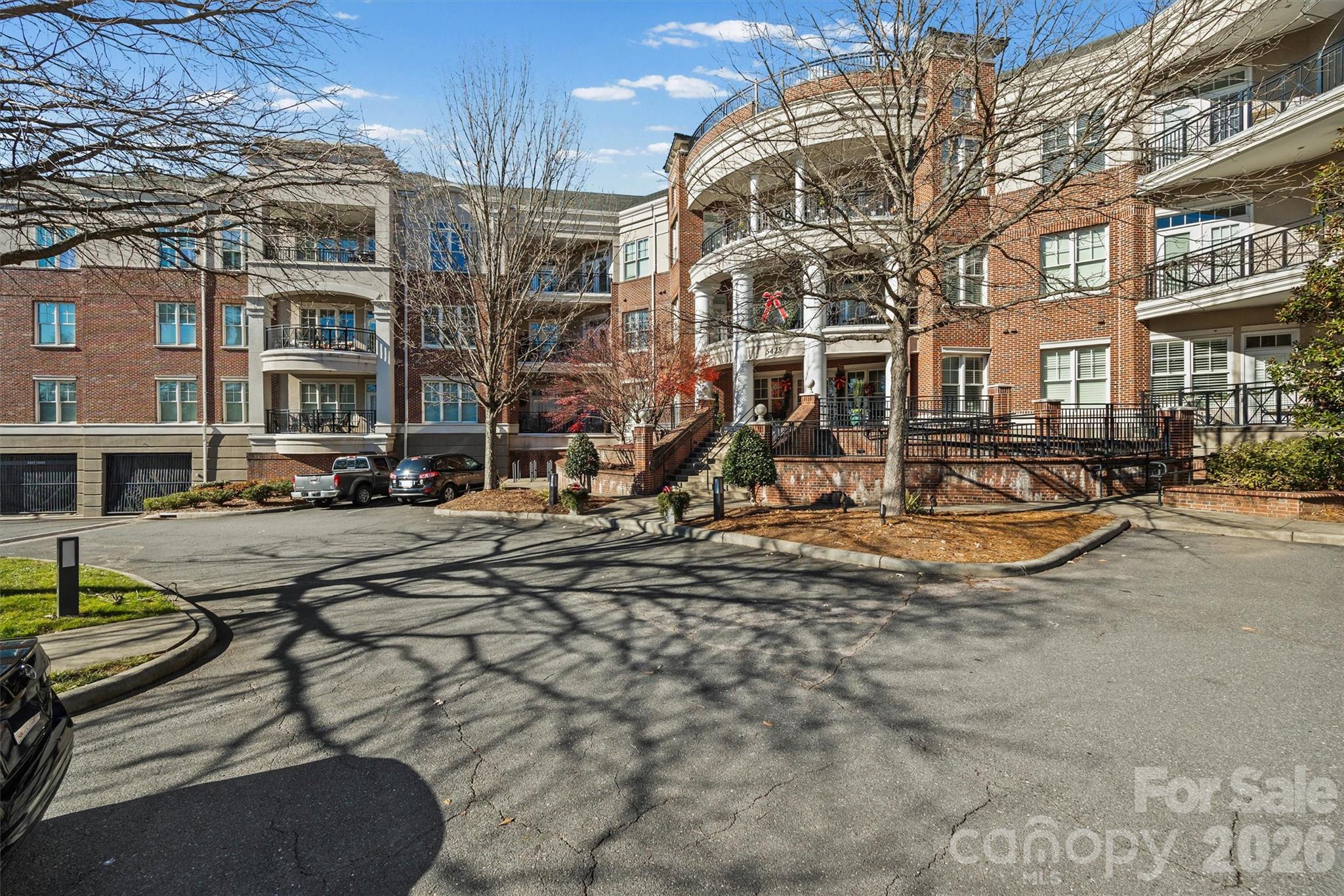 5425 Closeburn Road, Unit 214 Charlotte, NC 28210 - Photo 1 of 25 a view of a street with houses