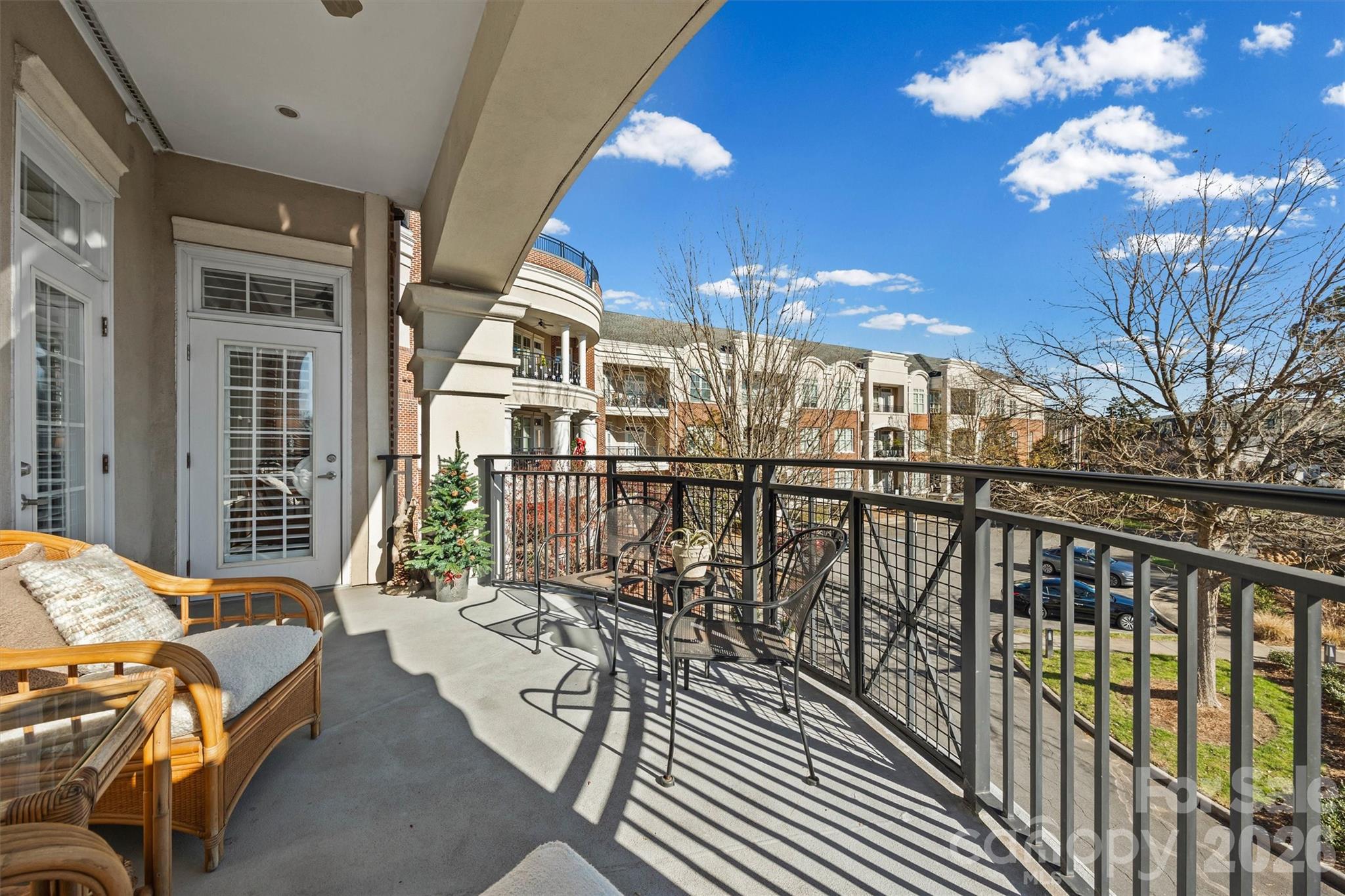 5425 Closeburn Road, Unit 214 Charlotte, NC 28210 - Photo 23 of 25 a balcony view with a seating space