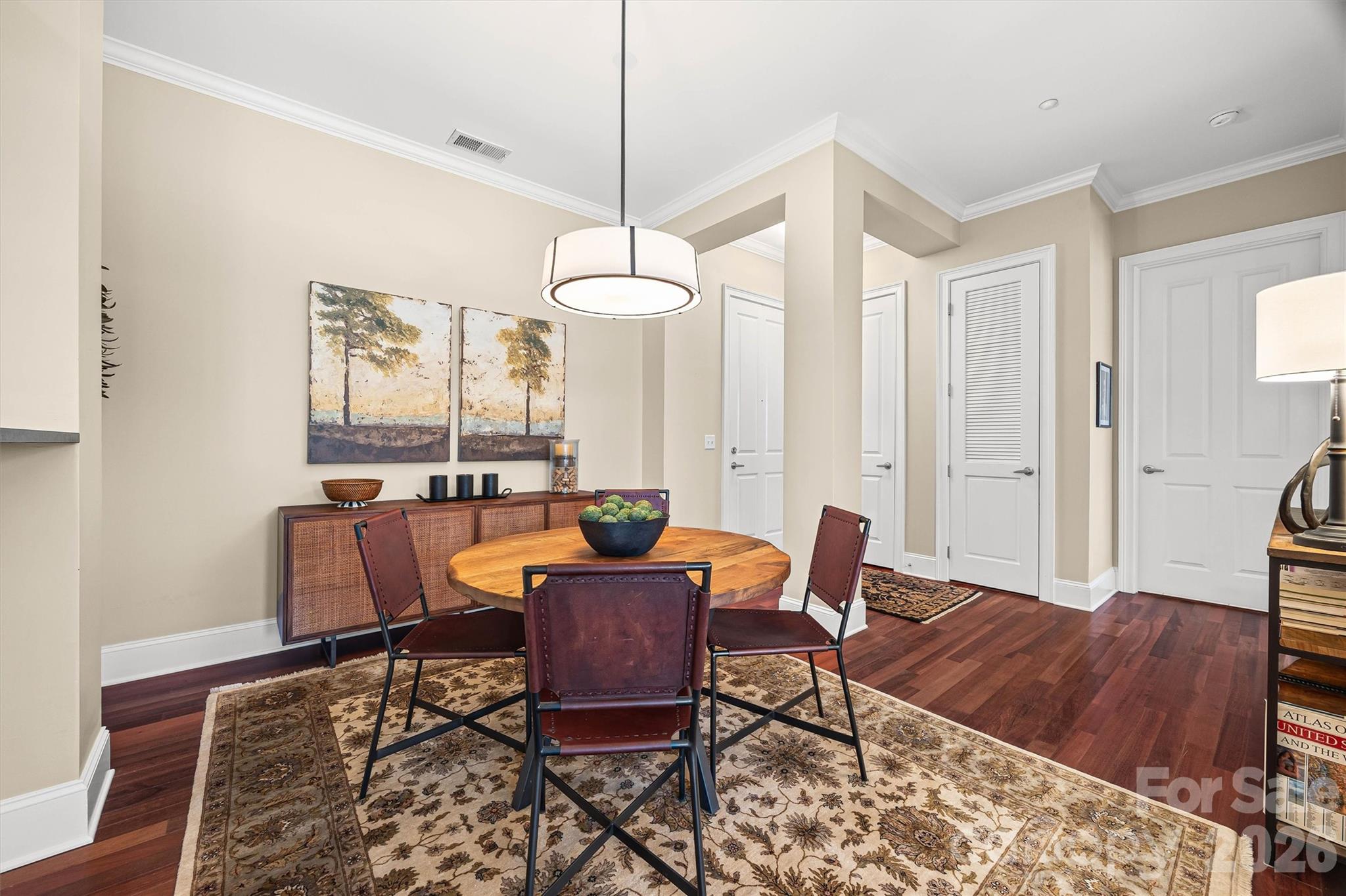 5425 Closeburn Road, Unit 214 Charlotte, NC 28210 - Photo 6 of 25 a view of a dining room with furniture
