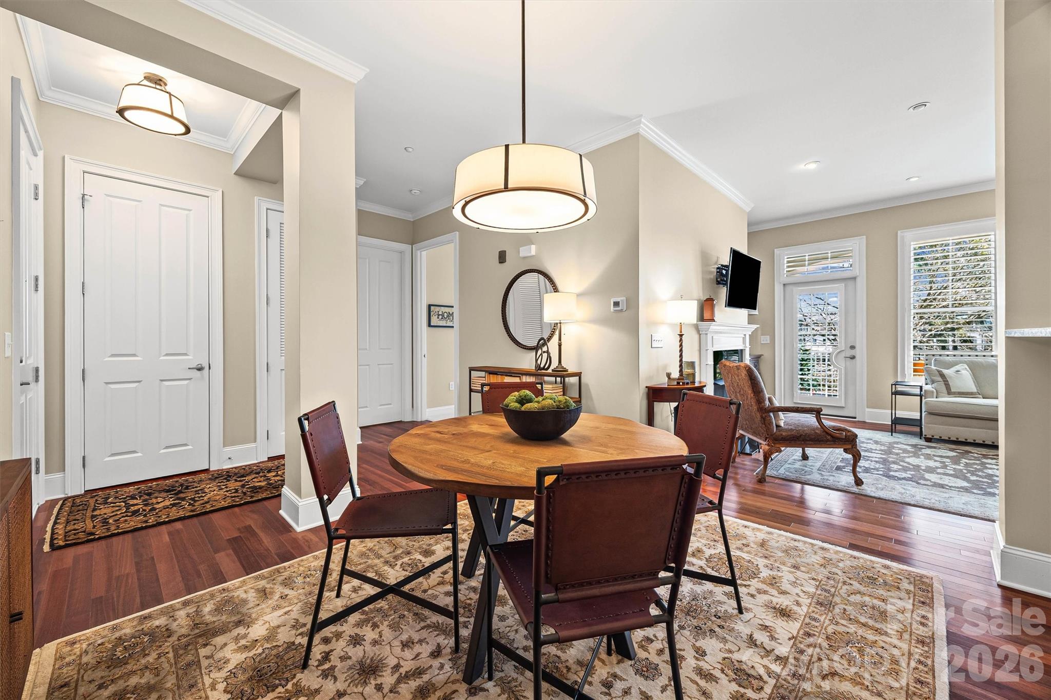 5425 Closeburn Road, Unit 214 Charlotte, NC 28210 - Photo 7 of 25 a view of a dining room with furniture window and wooden floor