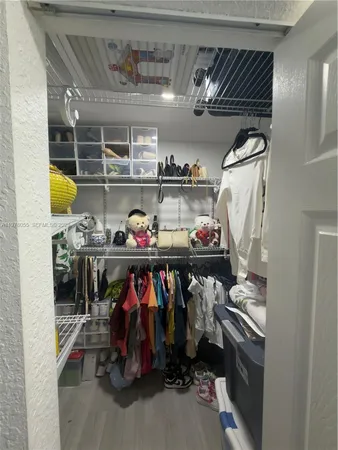 a view of storage and utility room