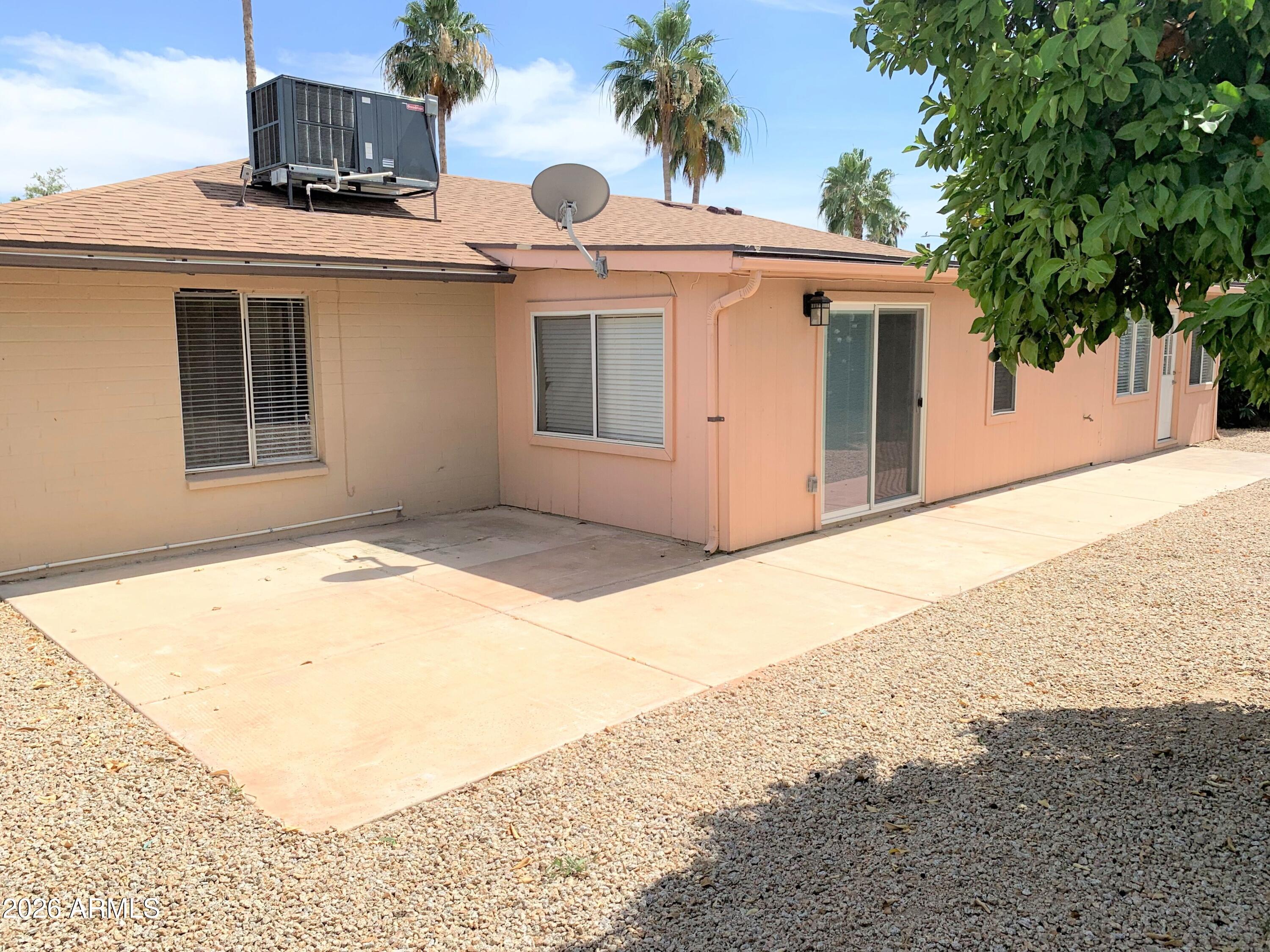 5916 East Spring Road Scottsdale, AZ 85254 - Photo 11 of 11 a front view of a house with a yard