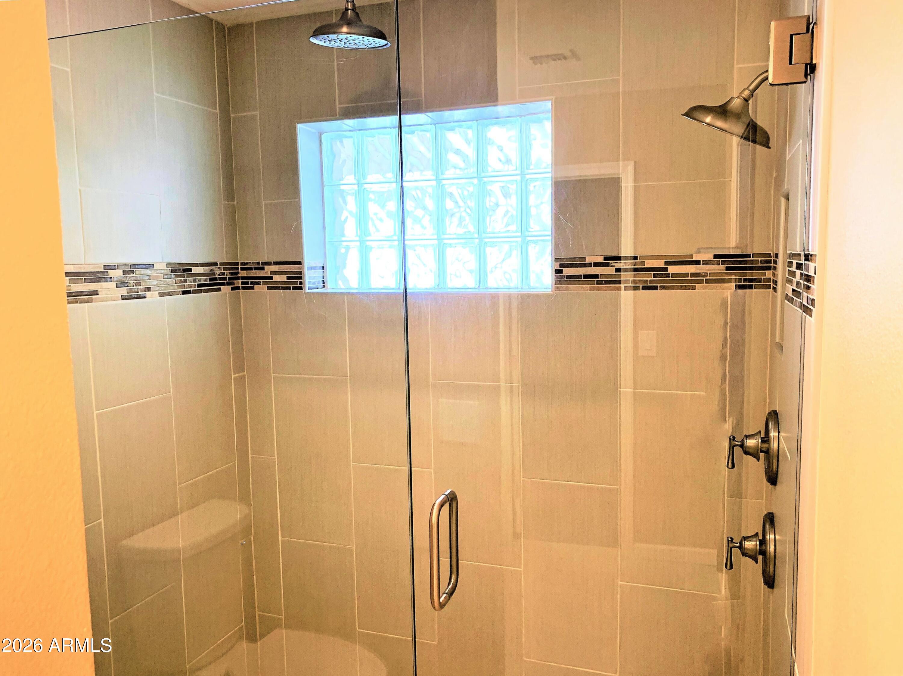 5916 East Spring Road Scottsdale, AZ 85254 - Photo 9 of 11 a bathroom with a shower