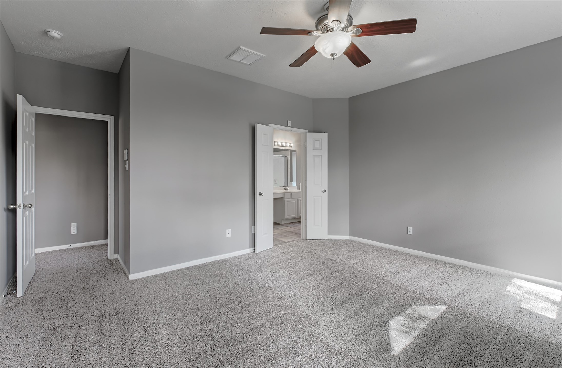 4018 Old Pine Grove Drive Humble, TX 77346 - Photo 20 of 26 a view of an empty room and a ceiling fan window