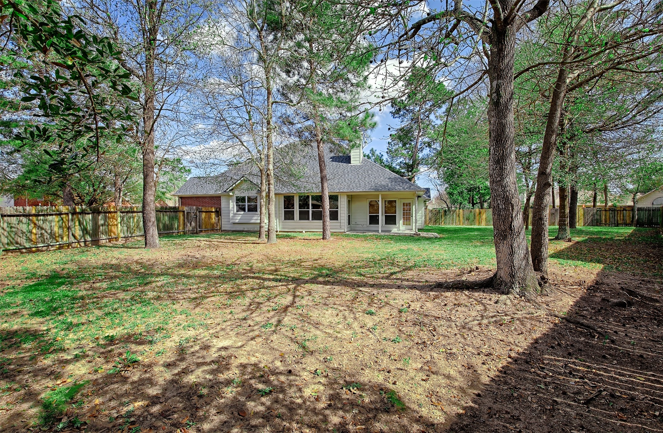 4018 Old Pine Grove Drive Humble, TX 77346 - Photo 23 of 26 a front view of a house with a yard
