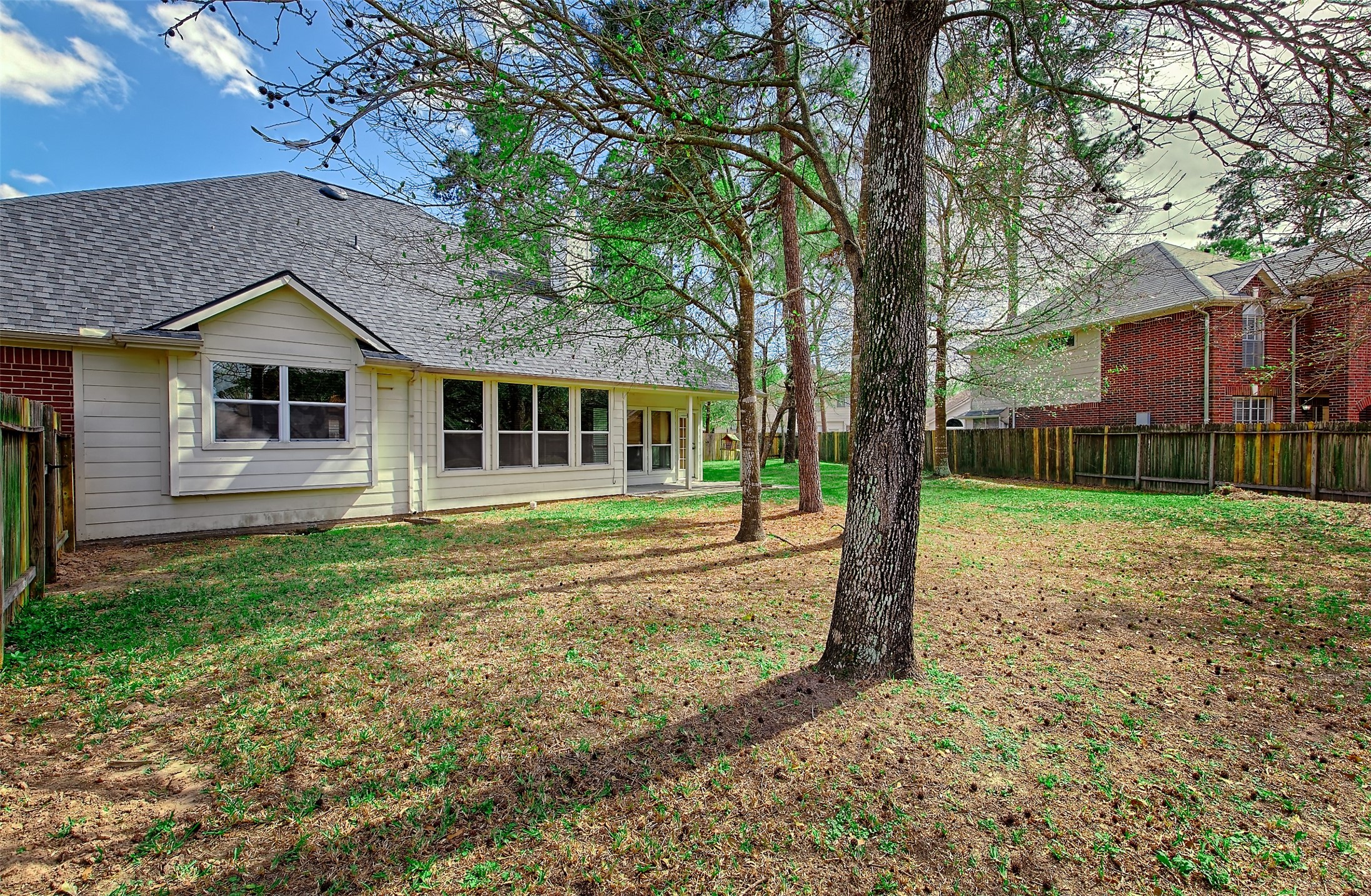 4018 Old Pine Grove Drive Humble, TX 77346 - Photo 24 of 26 a front view of a house with a yard