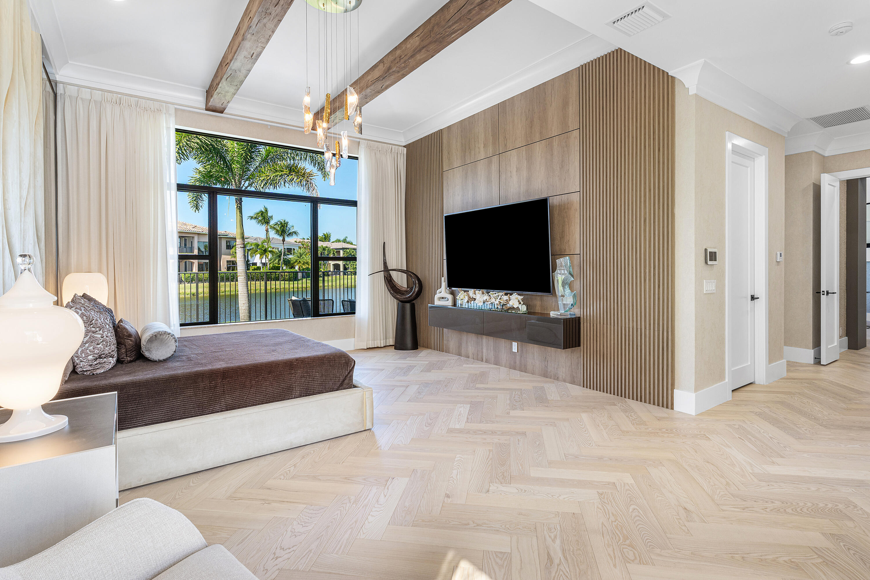 17709 Circle Pond Court Boca Raton, FL 33496 - Photo 22 of 50 a living room with a flat screen tv and a fireplace